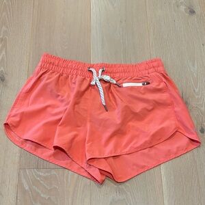 Vuori Women Size M Coral Athletic Shorts.